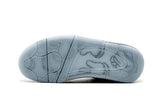 Air Jordan 4 Retro KAWS x 'Gris frío'